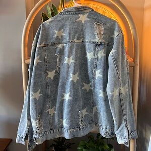 distressed jean jacket with stars printed